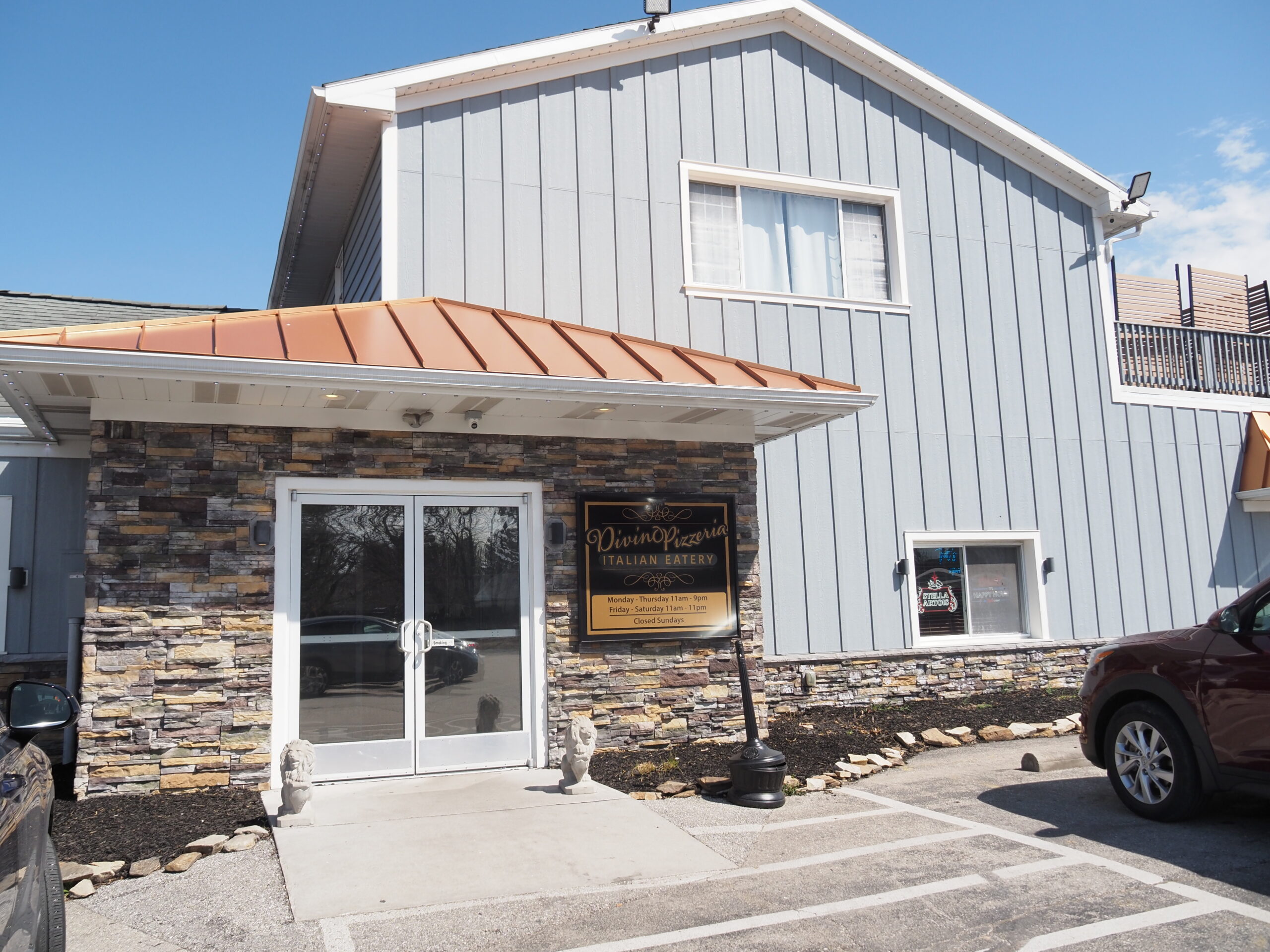 view of the front door to Divino Pizzeria & Grille from the parking at 612 Fredrick St. Hanover, PA